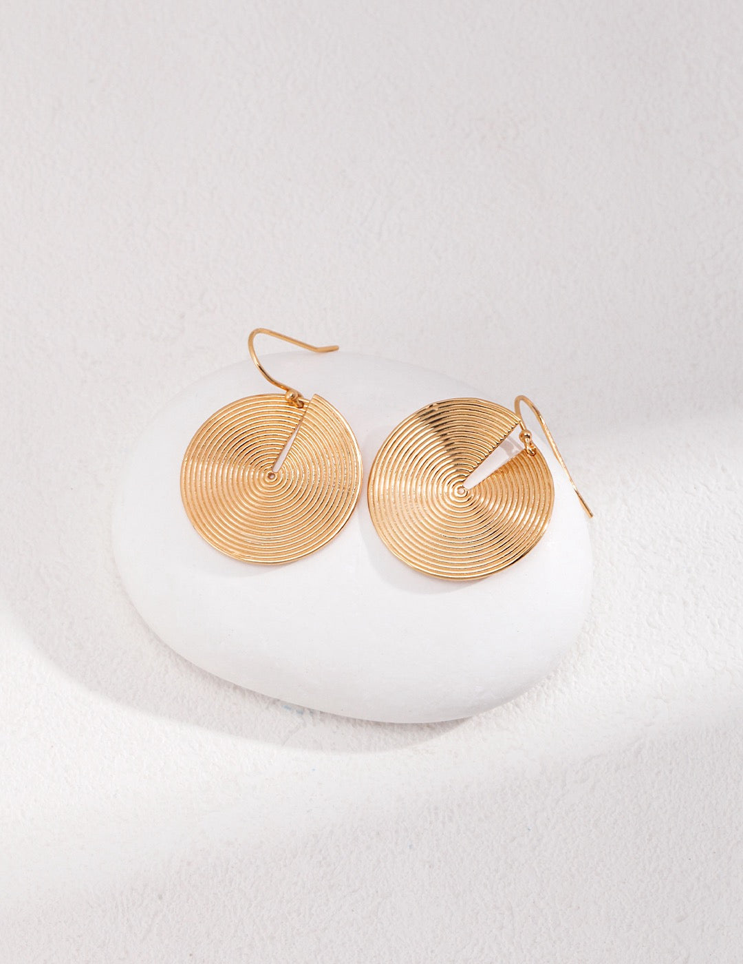 Circular Earrings with a spiral pattern