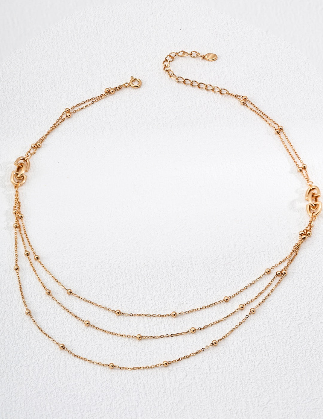 18K gold plated 925 silver multi-layer beaded chain necklace on white background