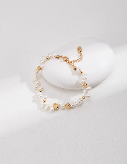 Gold and natural pearl bracelet with baroque pearls and adjustable chain, elegant handmade jewelry for women