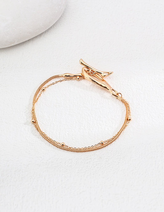 Multi-layer beaded chain bracelet with toggle clasp in 18K gold-plated 925 sterling silve