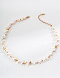 Freshwater baroque pearl necklace with 18K gold plated 925 silver chain on a white background