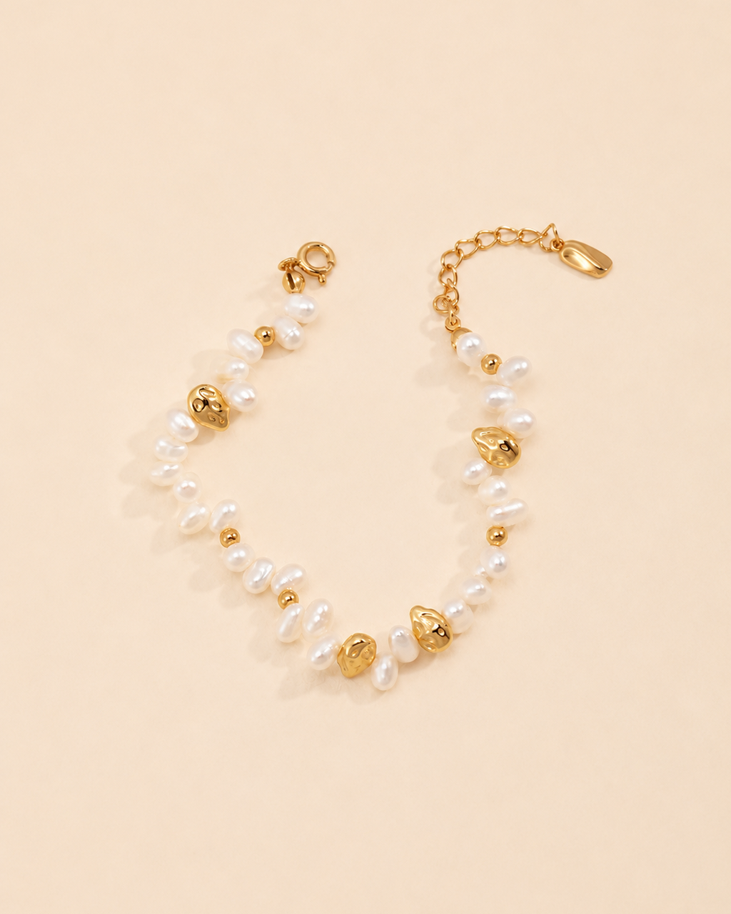 Close-up of the Aurielle Pearl Bracelet crafted with freshwater pearls and gold-plated accents.