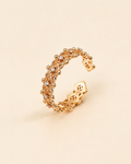 Adjustable gold crown ring featuring sparkling cubic zirconia and vintage lattice detailing.
