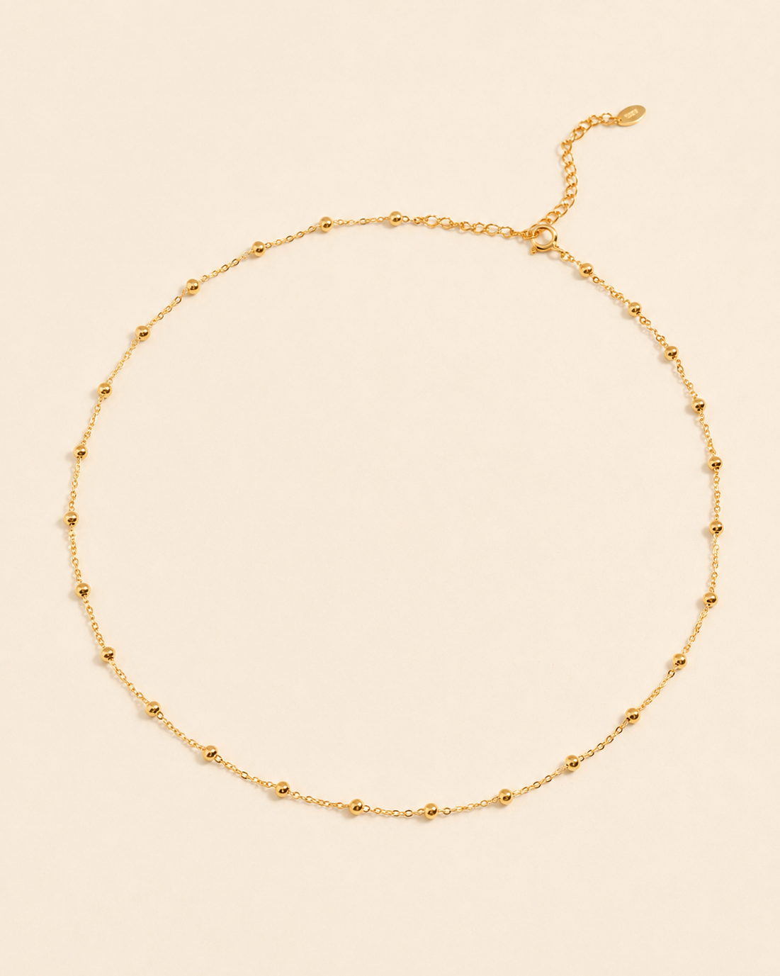Gold beaded layering necklace in S925 sterling silver with thick 18K gold plating, featuring delicate 3mm bead accents and adjustable chain.