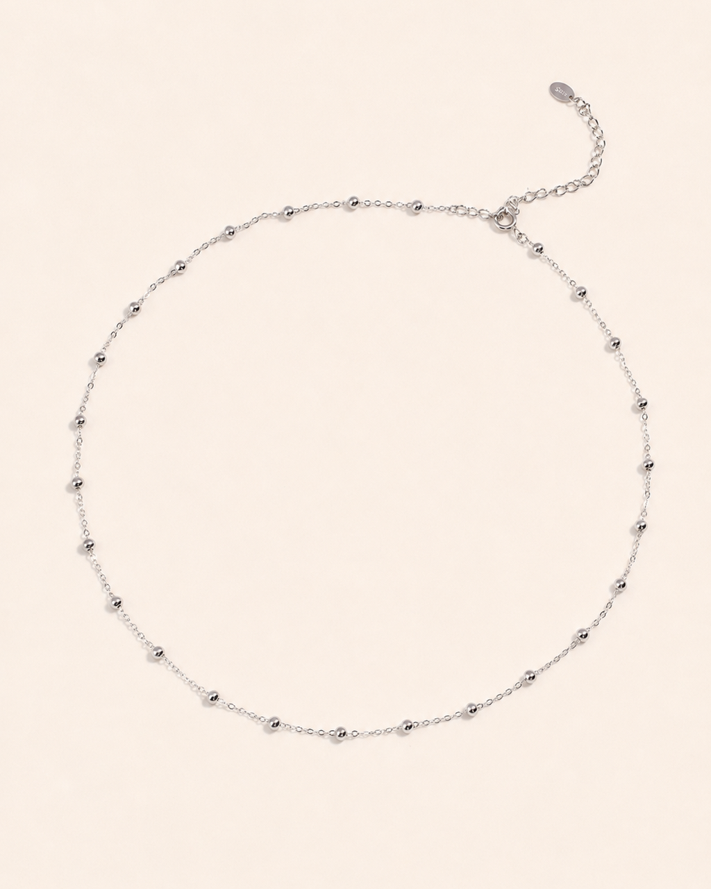 Silver beaded layering necklace in S925 sterling silver with thick 18K white gold plating, featuring delicate 3mm bead accents and adjustable chain.