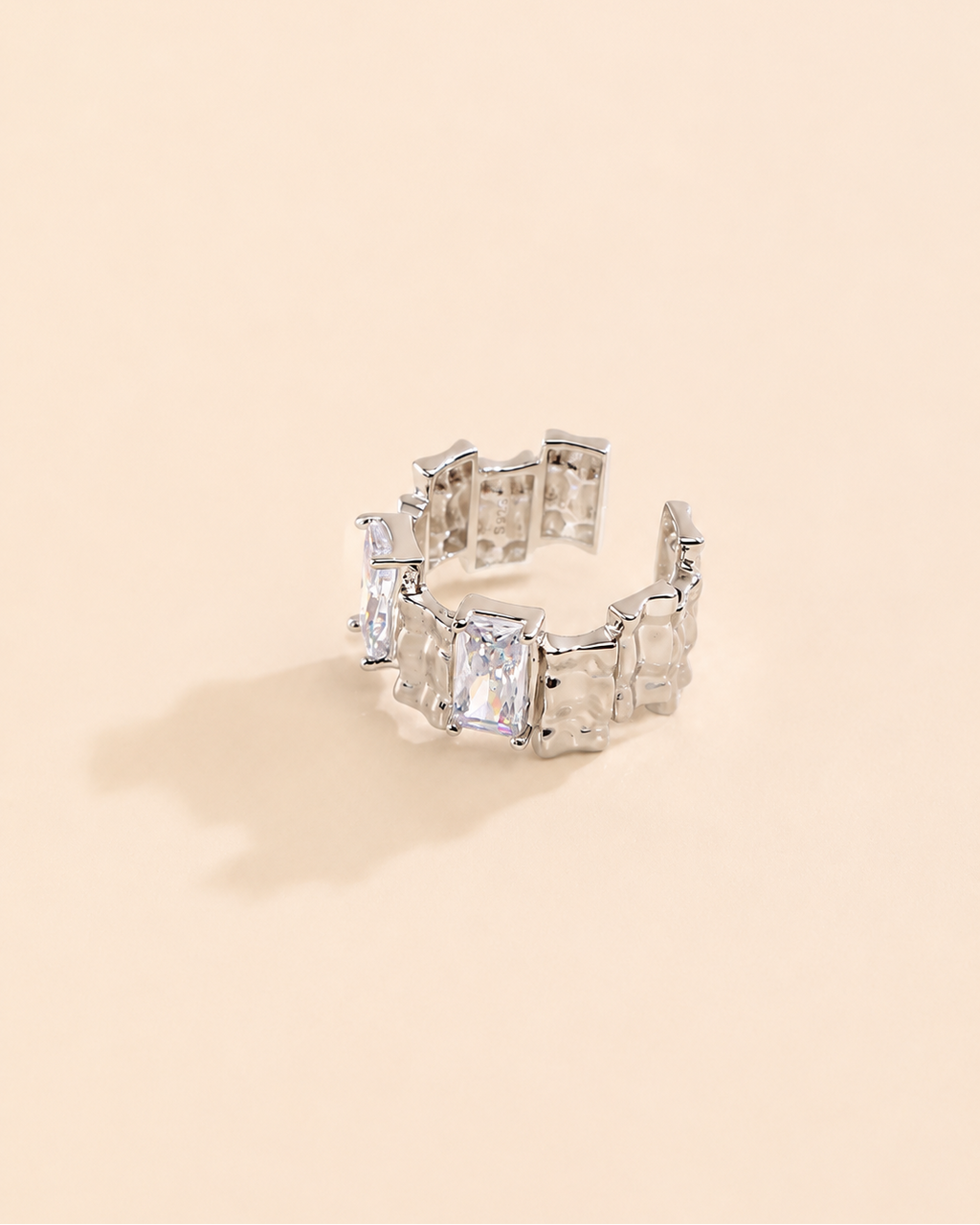 Back view of the Lumière Duo adjustable ring in thick 18K white gold plating with an open adjustable band.