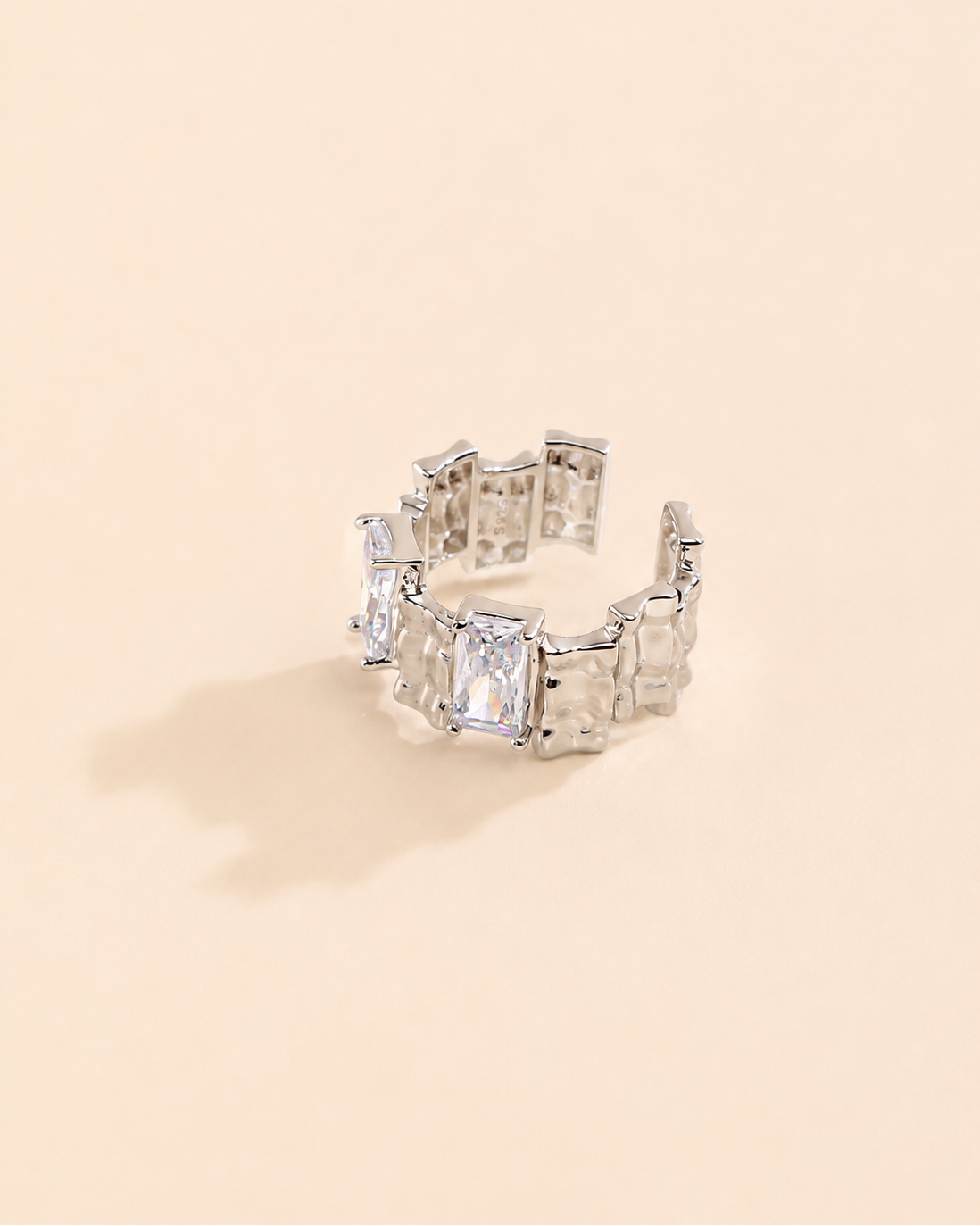 Back view of the Lumière Duo adjustable ring in thick 18K white gold plating with an open adjustable band.