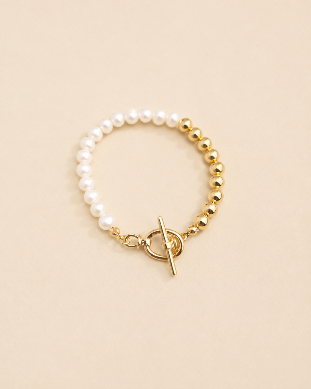 Luna Pearl T-Bar Bracelet in thick 18K gold plated S925 sterling silver with natural freshwater pearls on a soft ivory background.