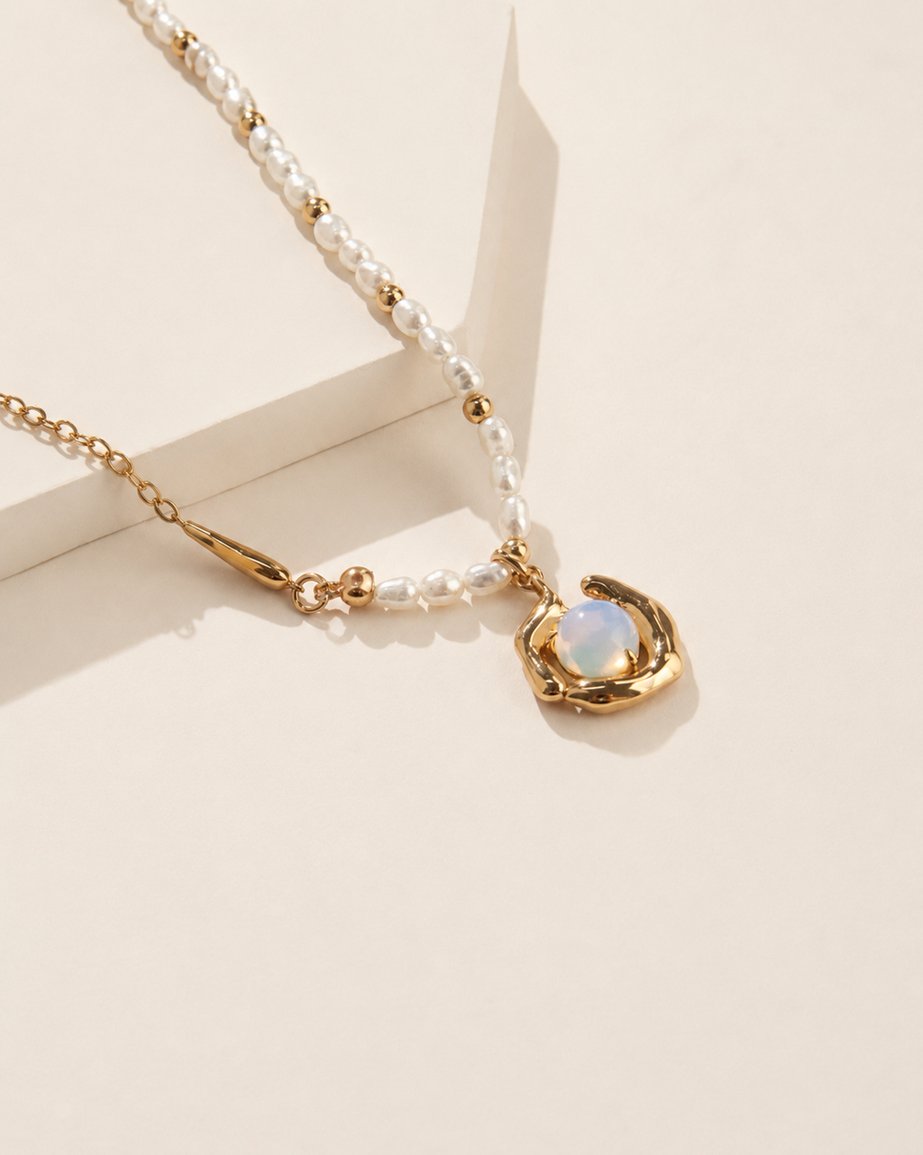 Freshwater pearl necklace with organic moonstone pendant in 18k gold vermeil, minimalist elegant jewelry for everyday wear.