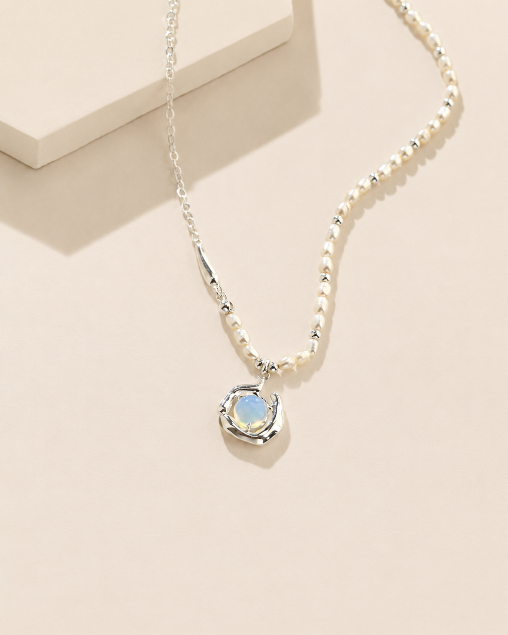 S925 sterling silver pearl necklace with natural freshwater pearls and opal pendant, minimalist organic jewelry on an ivory background.