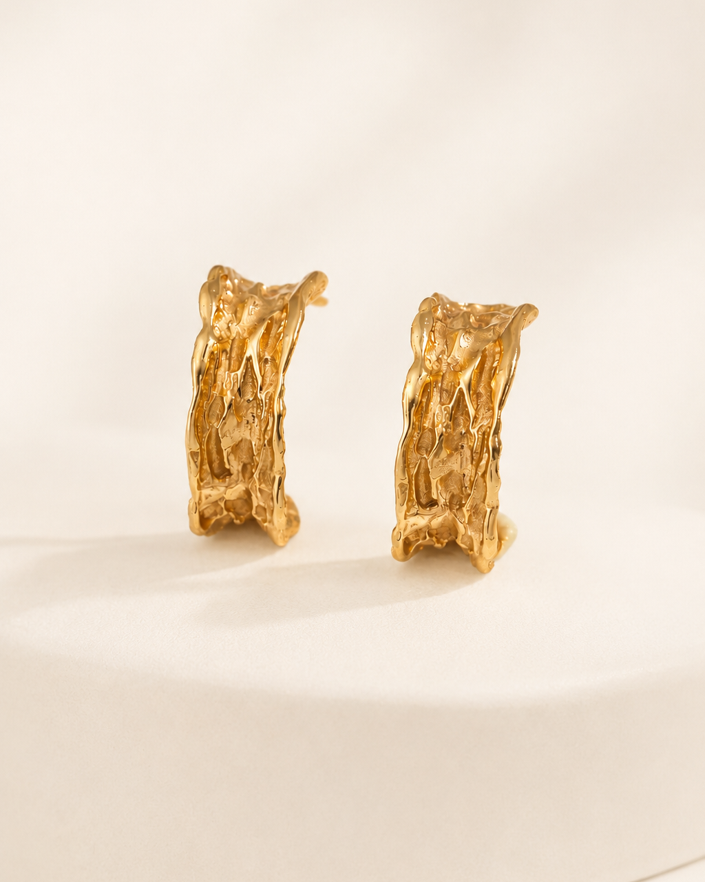 Textured molten gold hoop earrings in 18k gold plated sterling silver