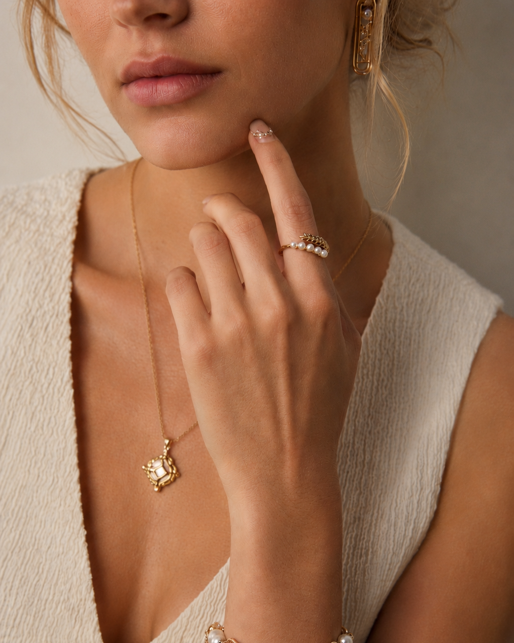 Model wearing the Pearl Laurel Open Ring crafted in S925 sterling silver with thick 18K gold plating and simulated pearls.