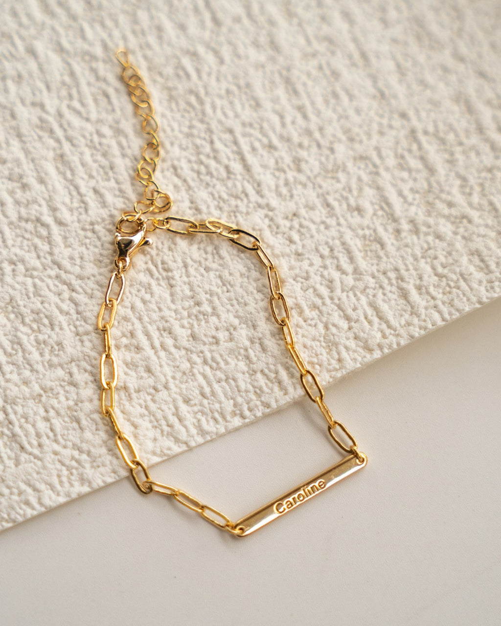 Personalized gold nameplate bracelet with custom engraving