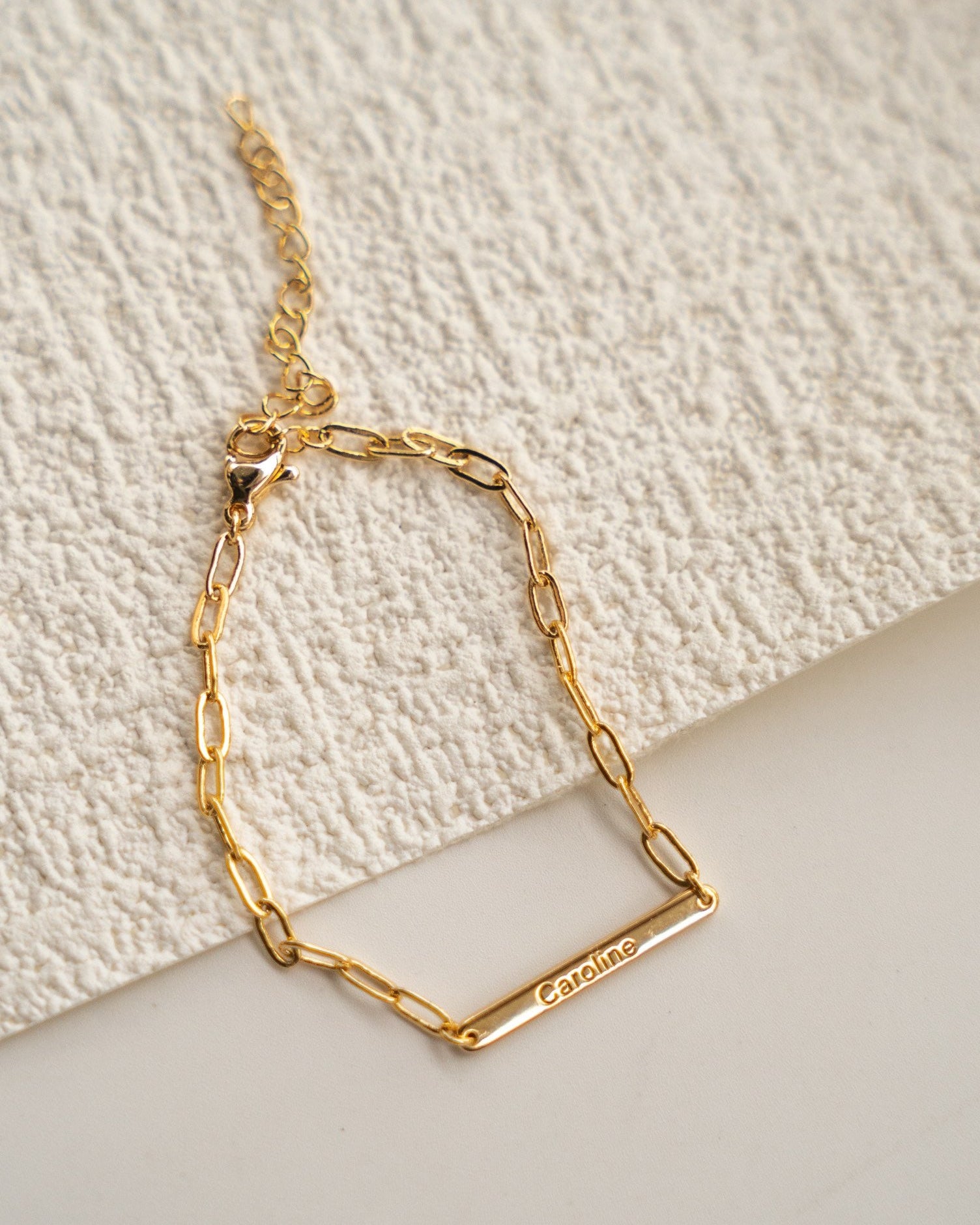 Personalized gold nameplate bracelet with custom engraving