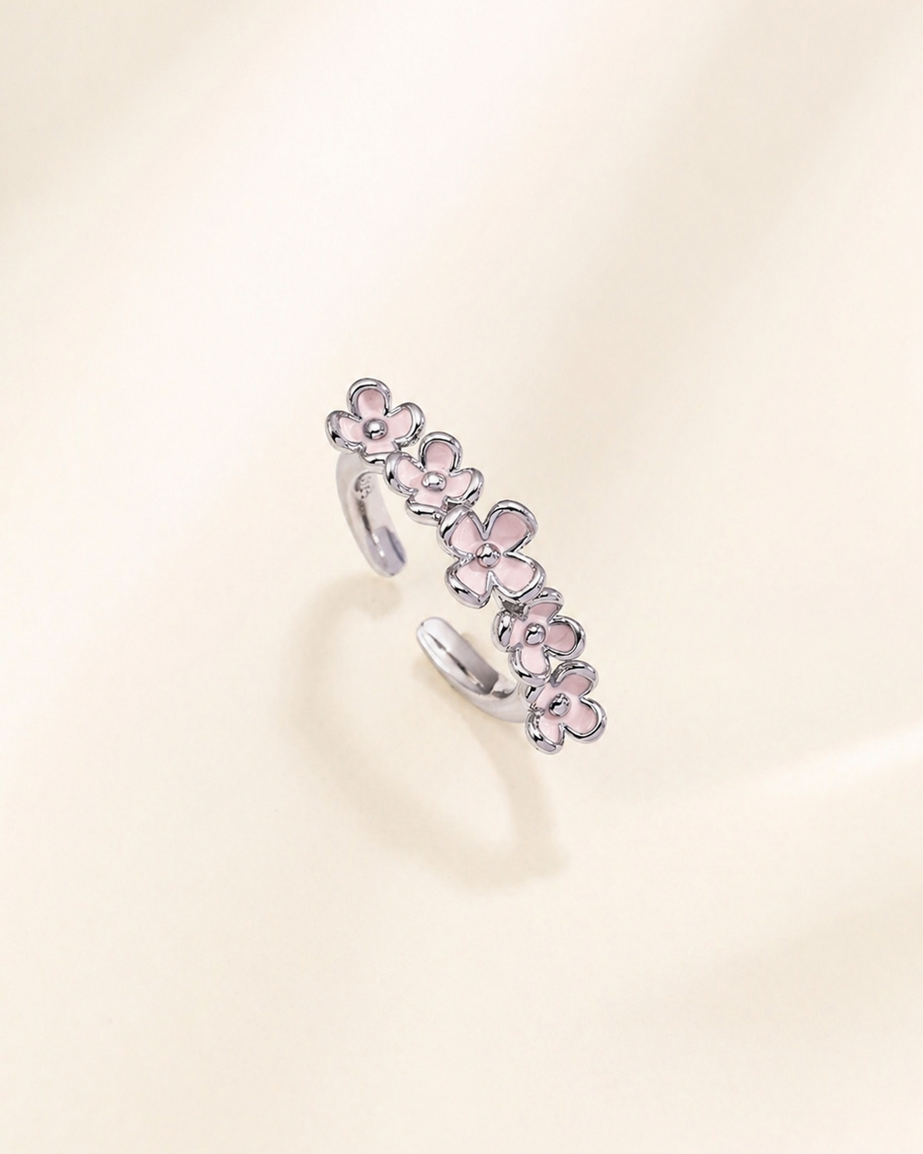 Pink blossom adjustable flower ring in white gold plated sterling silver
