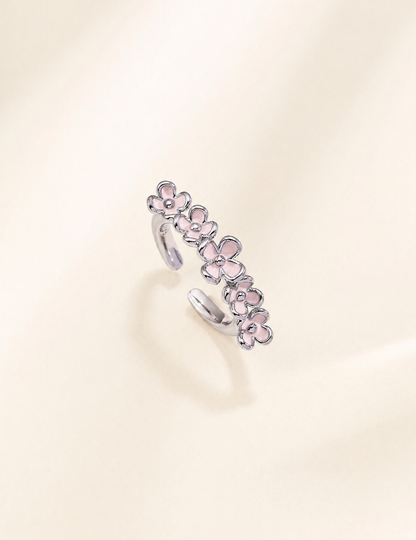 Pink blossom adjustable flower ring in white gold plated sterling silver