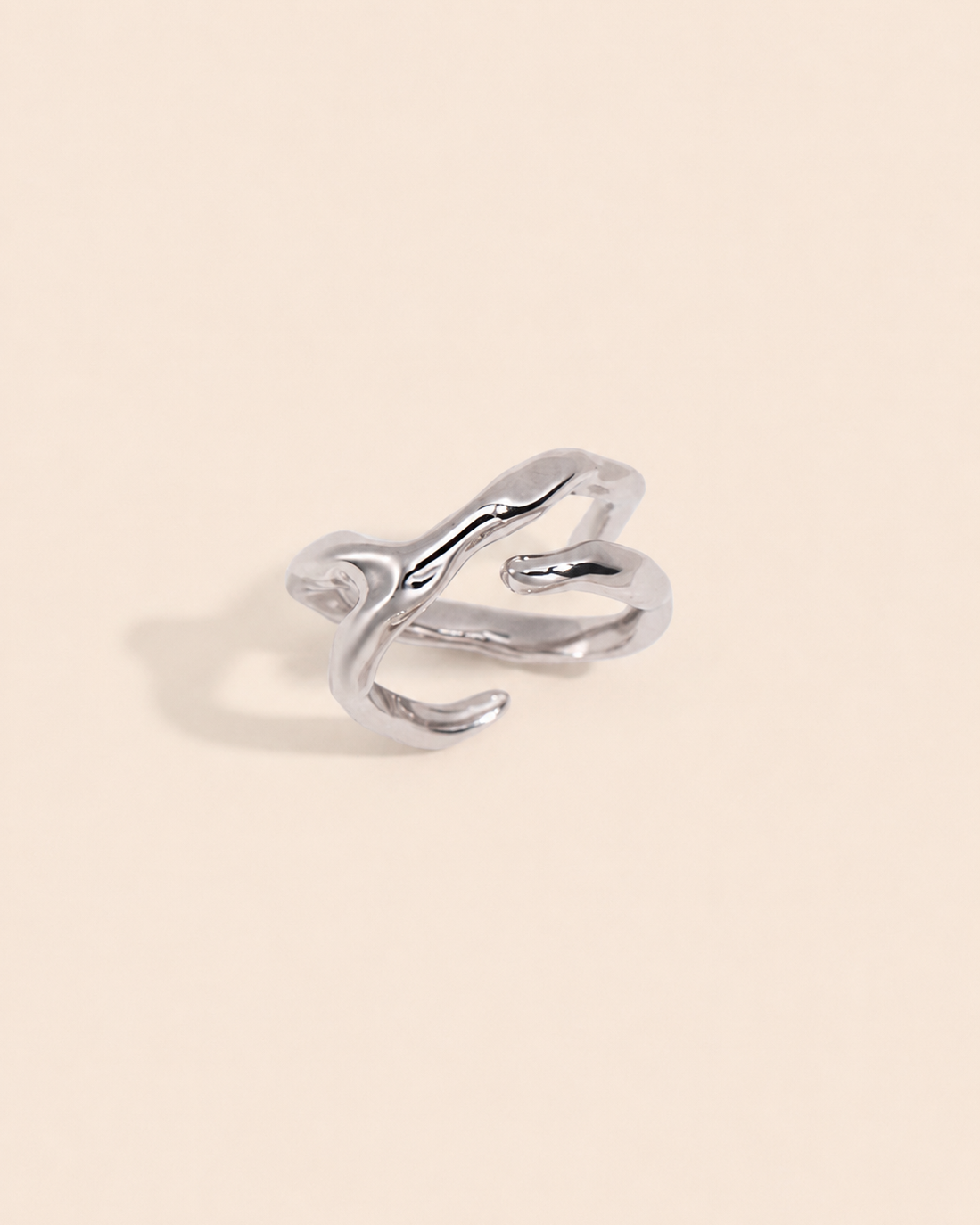 Sculpt Flow Ring in 18K white gold plated S925 sterling silver with a modern organic sculptural silhouette.