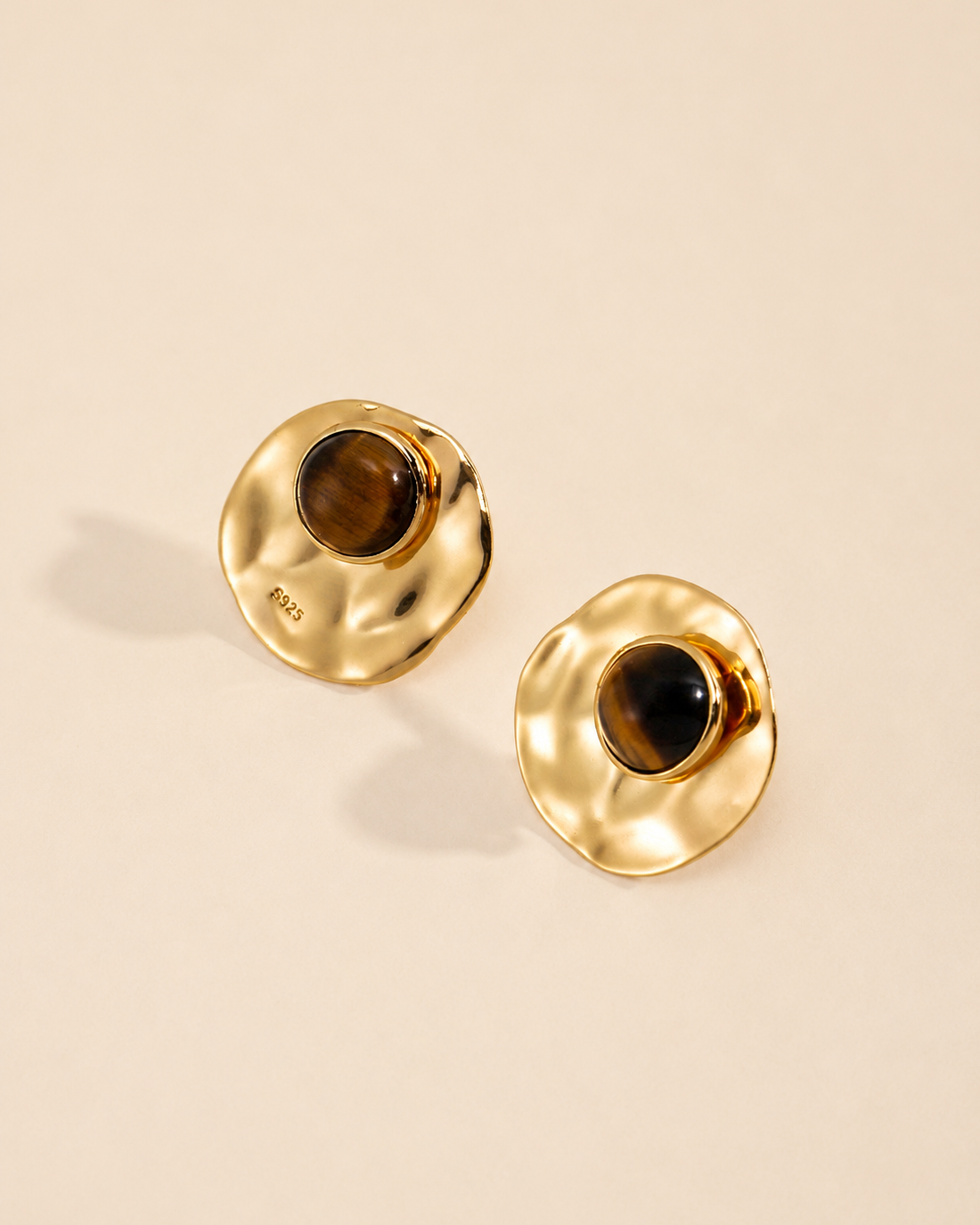 Convertible tiger eye earrings crafted in S925 sterling silver with thick 18K gold plating, featuring natural tiger eye gemstones and detachable hammered disc jackets.