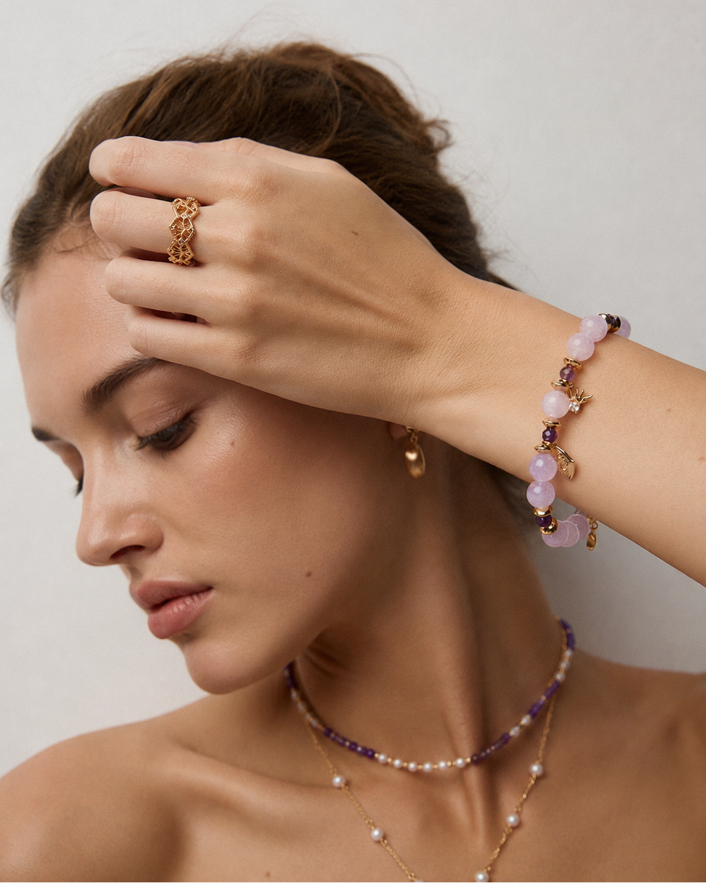 Model wearing the Vintage Lace adjustable ring in S925 sterling silver with thick 18K gold plating and cubic zirconia, showcasing an elegant vintage filigree design.